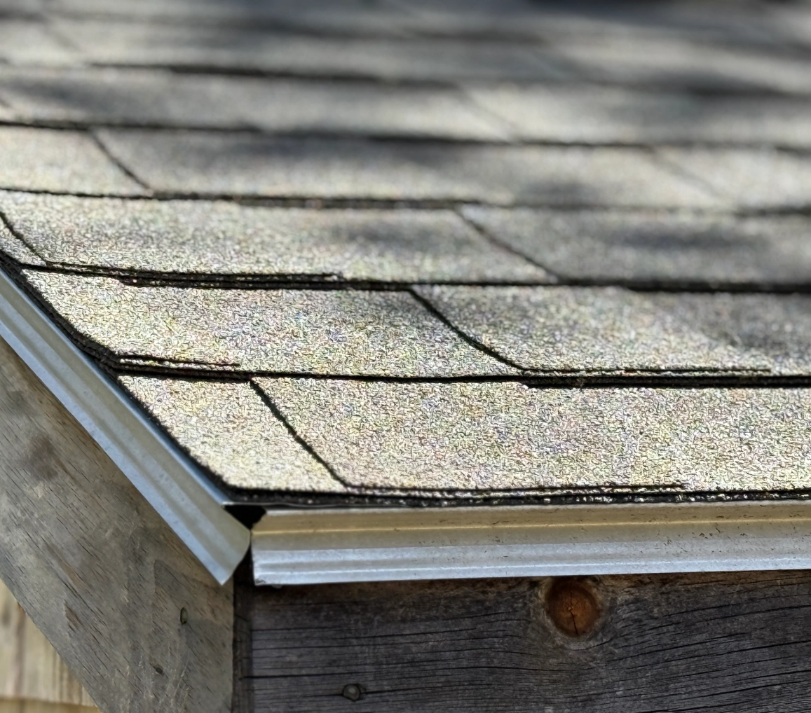 Roof shingles with sunlight reflection