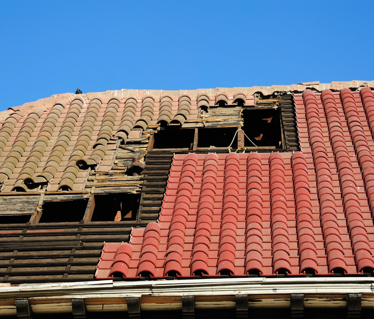Old roof with new red tiles