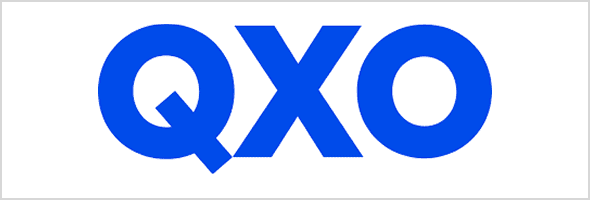 QXO text in blue font